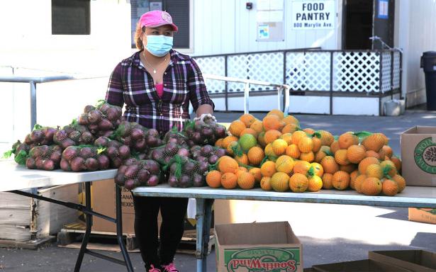An Alameda County Community Food Bank worker in Oakland, California. 