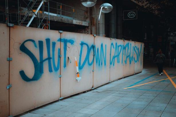 Gravity on a wall:  Shut Down Capitalism
