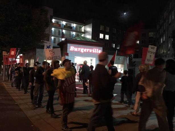 Supporters of the Burgerville Workers Union picket outside the fast-food chain's Lloyd Center restaurant. Credit: Burgerville Workers Union