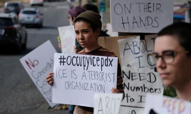 people demonstrating against ICE