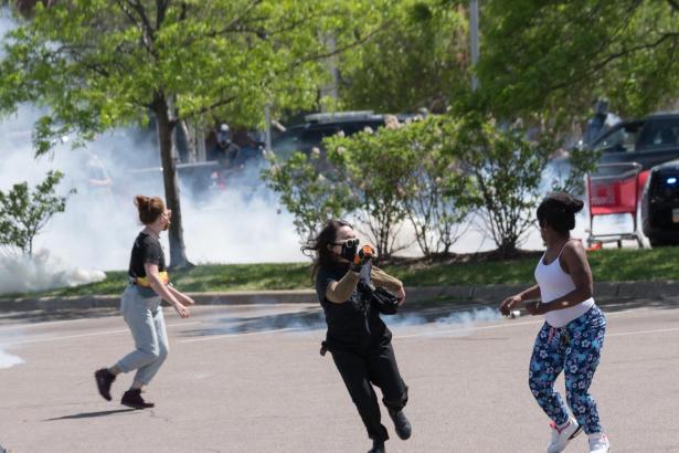 peaceful protesters gased with tear gas by police