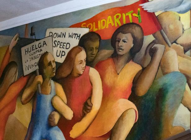 women workers painted in a mural