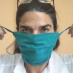 Cuban doctor putting on mask