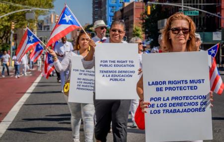 Puerto Ricans participate in a silent protest in New York. 
