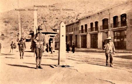 In 1914, US and Mexican soldiers march up and down to maintain the boundary between Nogales, Arizona and Nogales, Sonora, Mexico. 