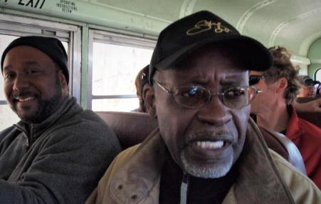 African-American men sitting in a bus